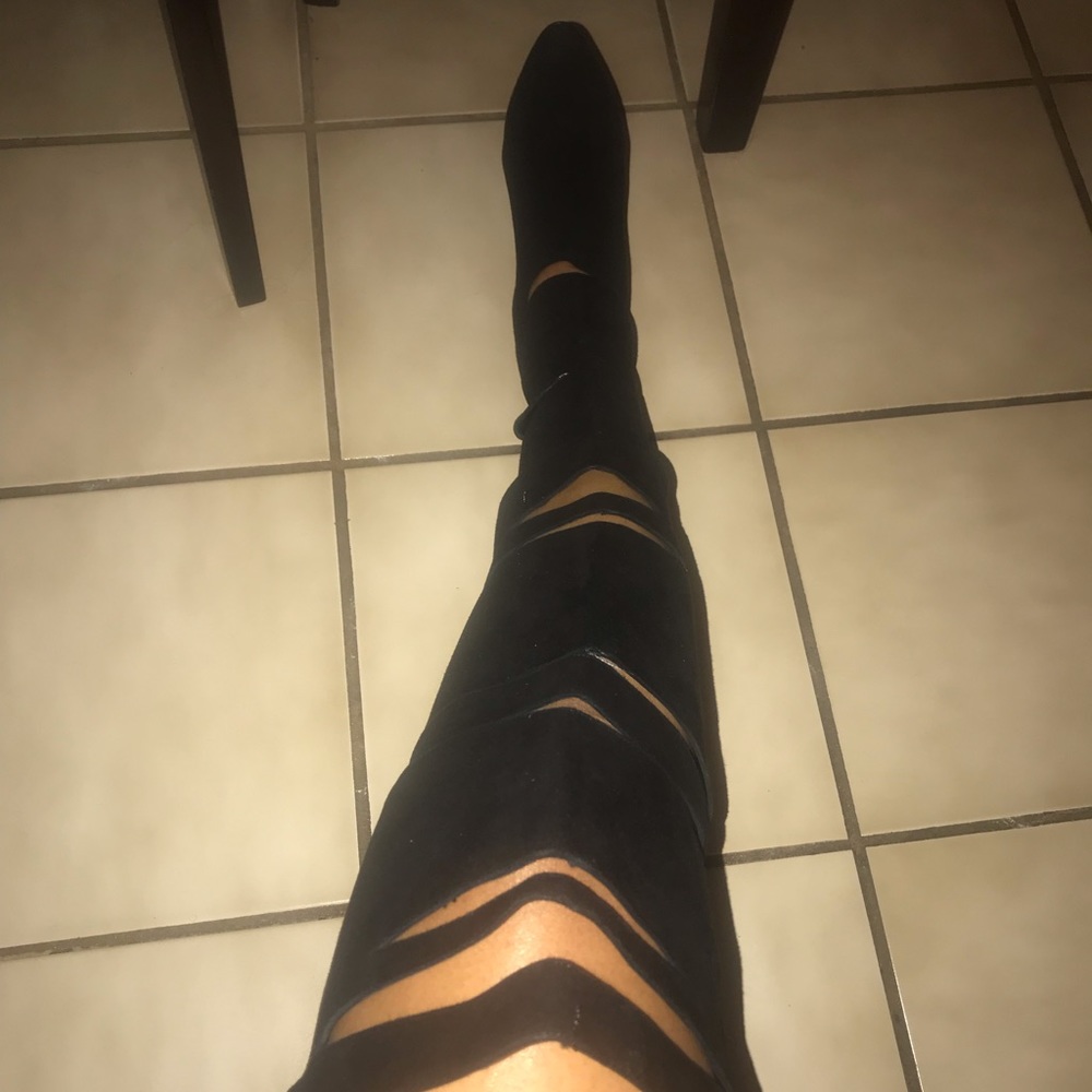 Giuseppe Zanotti over the knee suede boots.